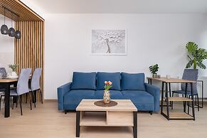 Dark Blue Apartment in Kraków by Renters