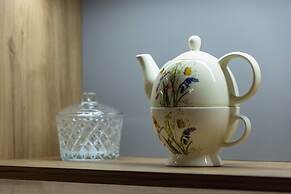 Dark Blue Apartment in Kraków by Renters