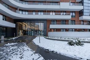 Dark Blue Apartment in Kraków by Renters