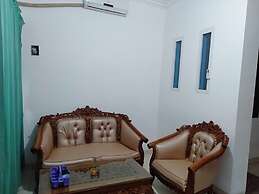 OYO 93476 Owo Guest House Syariah