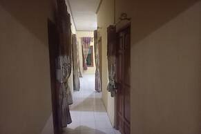 SPOT ON 93542 Suripah Kostel Syariah