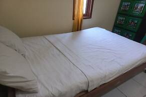 SPOT ON 93542 Suripah Kostel Syariah