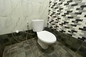 SPOT ON 93510 Penginapan Melati Tanjung Near Kantor Pengamat Pengairan