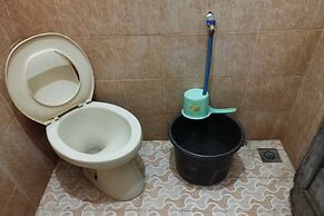 SPOT ON 93510 Penginapan Melati Tanjung Near Kantor Pengamat Pengairan