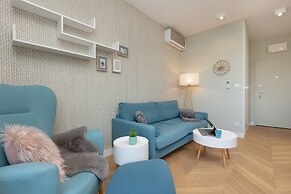 Bright Blue Apartment by Renters