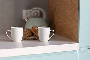 Bright Blue Apartment by Renters