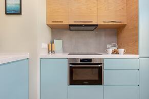 Bright Blue Apartment by Renters