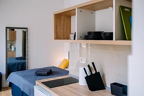 Art Deco City Walls Studios by DuHomes