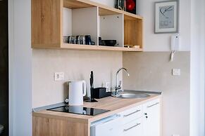 Art Deco City Walls Studios by DuHomes