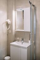 Art Deco City Walls Studios by DuHomes