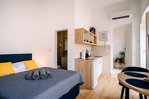 Art Deco City Walls Studios by DuHomes