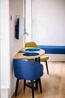 Art Deco City Walls Studios by DuHomes