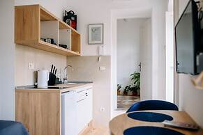 Art Deco City Walls Studios by DuHomes