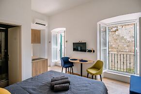 Art Deco City Walls Studios by DuHomes