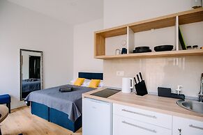 Art Deco City Walls Studios by DuHomes