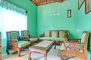 SPOT ON 93527 Agus Kostel SyariahNearWisata Agro Jollong