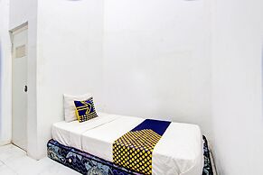 SPOT ON 93527 Agus Kostel SyariahNearWisata Agro Jollong