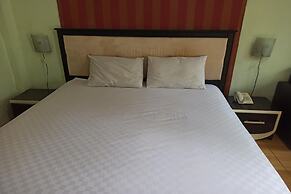 OYO 93521 Wisma Flamboyan NearTaman Makam Pahlawan