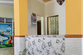 OYO 93521 Wisma Flamboyan NearTaman Makam Pahlawan