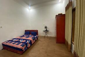 SPOT ON 93519 Kebun Manis Homestay Near Lapangan Bola Volly Batu Kumbu