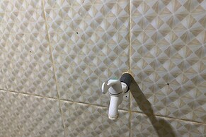 SPOT ON 93519 Kebun Manis Homestay Near Lapangan Bola Volly Batu Kumbu