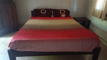 SPOT ON 93524 Bagas Homestay Near DWH (Tourism Village Green) BILEBANT