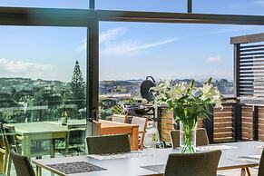 Taonga with panoramic sea views