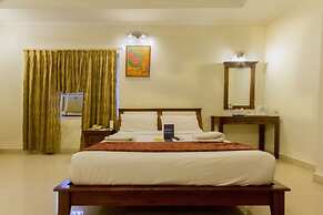 Blossoms Hotel and Service Apartment