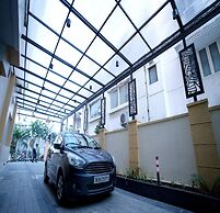 Blossoms Hotel and Service Apartment