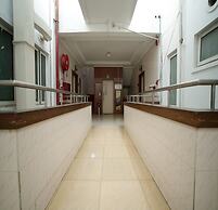 Blossoms Hotel and Service Apartment