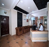 Blossoms Hotel and Service Apartment