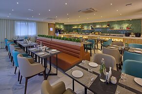 Grand Continent Hebbal a Sarovar Portico Affiliate Hotel