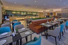 Grand Continent Hebbal a Sarovar Portico Affiliate Hotel