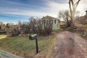 Central Rapid City Home w/ Sunroom & Fireplace!