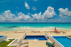 Private pool in beach front Villa