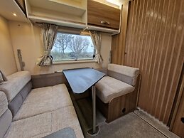 Brand new Touring Caravan Sited all Setup Ready