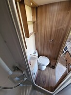 Brand new Touring Caravan Sited all Setup Ready