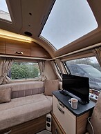 Brand new Touring Caravan Sited all Setup Ready