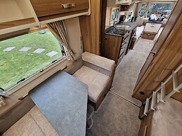 Brand new Touring Caravan Sited all Setup Ready