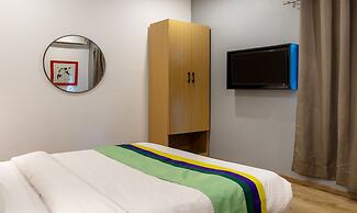 Treebo Treetops Inn - Anna Nagar