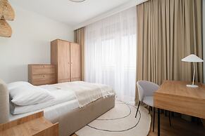 Beige Apartment Poznań by Renters