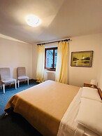 San Luigi Rooms & Apartments