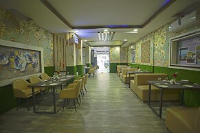 Q Saina's S K Regency