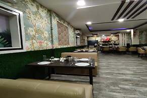 Q Saina's S K Regency