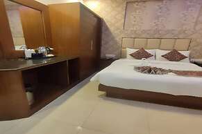 Q Saina's S K Regency