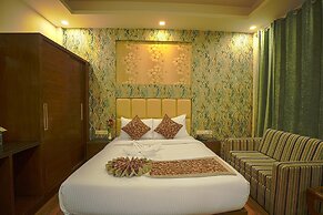Q Saina's S K Regency