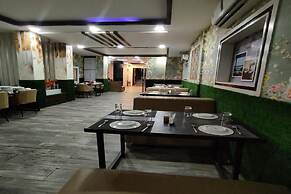 Q Saina's S K Regency