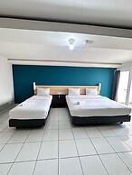 IZI COZI HOTEL KEMAYORAN