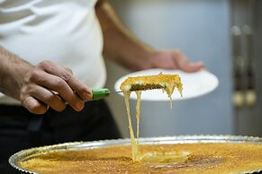 Wome Prime Hotel - Halal