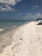 Steps to Beach Heated Pool Golf Cart Included